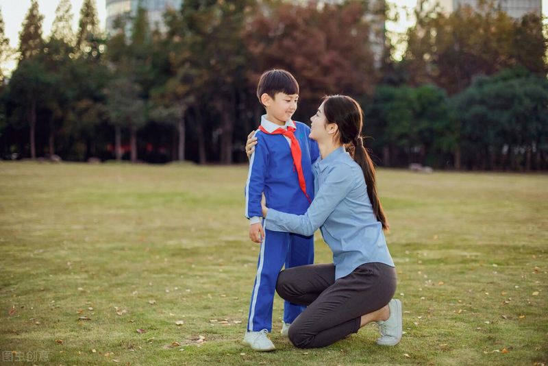 A parent kneeling to speak eye-to-eye with a child, demonstrating respectful communication